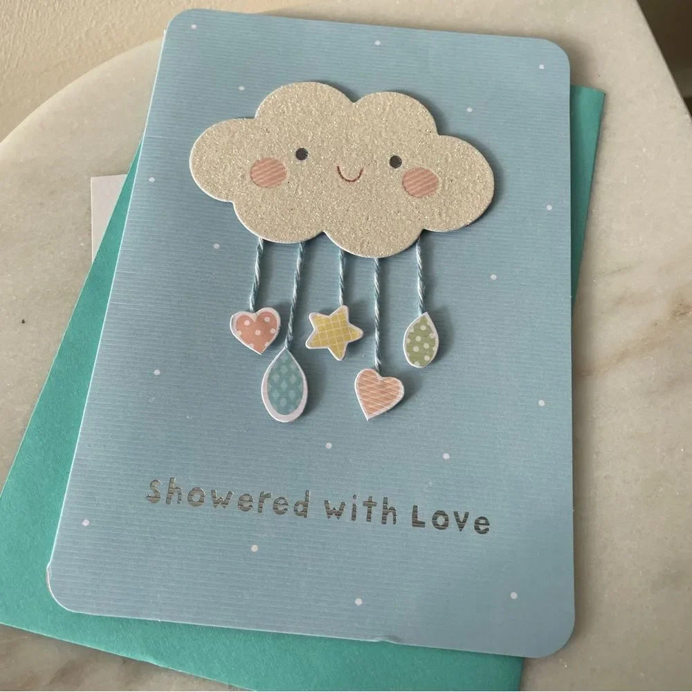 Blue baby shower‎ greeting card with cloud  graphic